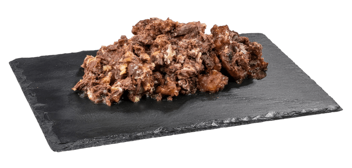 Contents of a Topstein Beef and Heart in a Can on a board