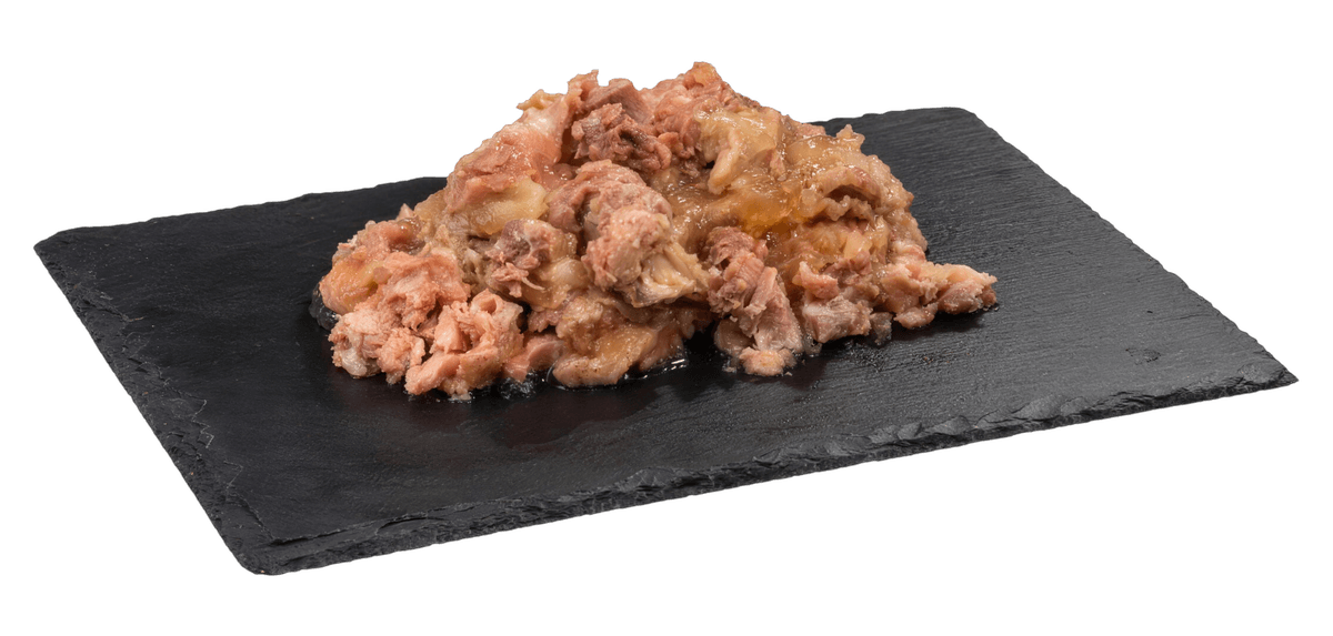 Contents of a Topstein Chicken and Tripe in a Can on a board